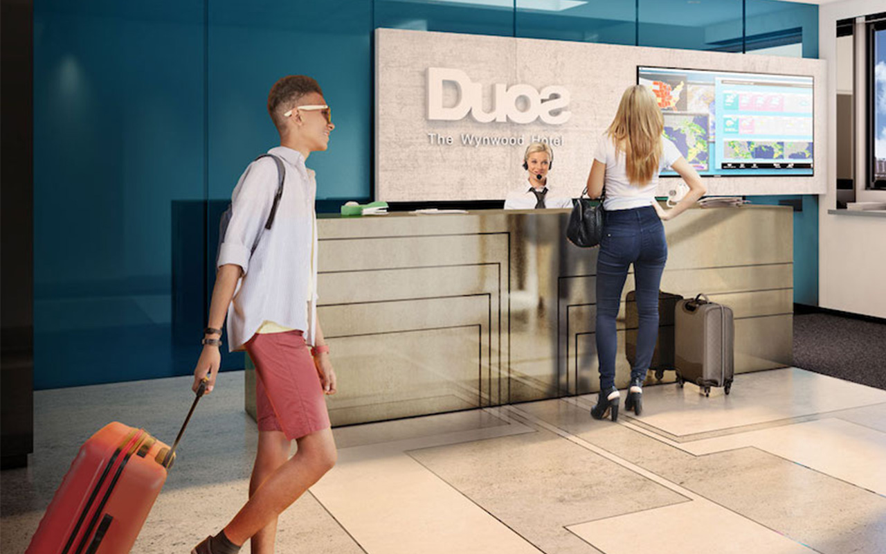DUOS Wynwood — lobby estilo hotel con concierge en Wynwood, Miami