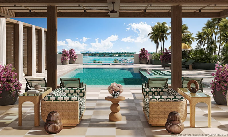 Palma Residences — piscina con lounge y vista al mar