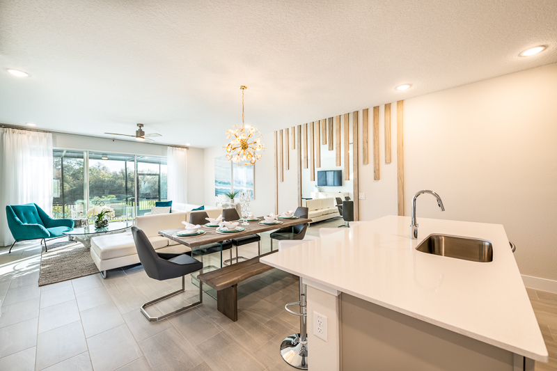 Interior modelo de townhome SPECTRUM+ at Reunion Resort: sala comedor de 3 dormitorios en Kissimmee, Orlando